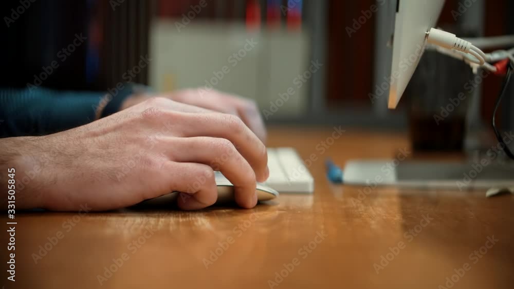 Man Hand With Wireless Mouse.Software Developer Man Using Mouse In Office.Creative Businessman With Computer Overtime Working At Open Space Room On Night.Businessman Working In Office Design Studio Man Hand With Wireless Mouse.Software Developer Man Using Mouse In Office.Creative Businessman With Computer Overtime Working At Open Space Room On Night.Businessman Working In Office Design Studio