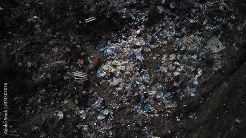 Wallpaper Mural A scattered pile of garbage in the middle of the field.The camera rises from the bottom up, shooting from a quadcopter Torontodigital.ca