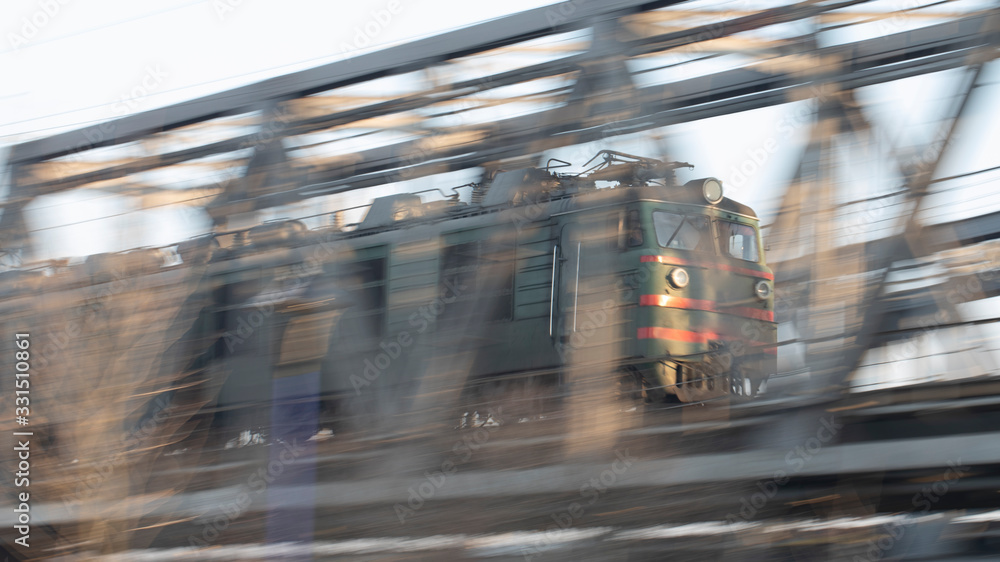 The high-speed train passes through the bridge. The high-speed train passes through the bridge.
