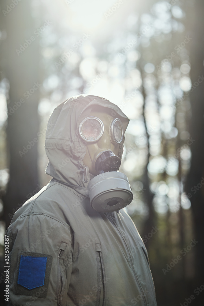 man in a gas mask protects himself from coronavirus man in a gas mask protects himself from coronavirus