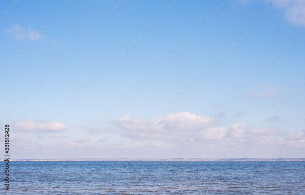 Beautiful sea views with floating clouds on the blue sky.