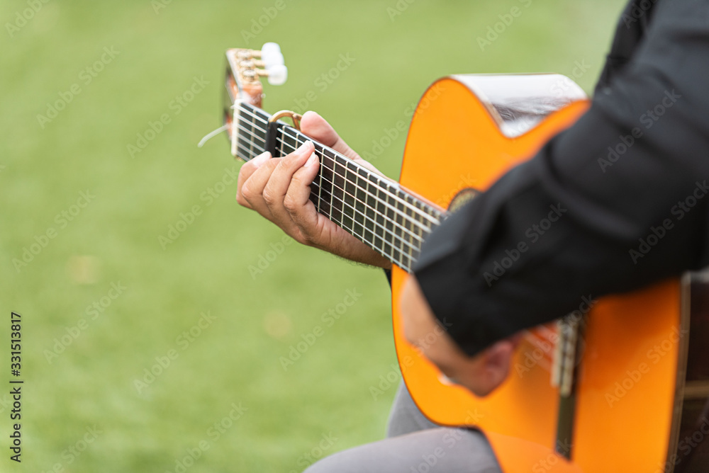 Guitarrista tocando guitarra española Stock Photo | Adobe Stock