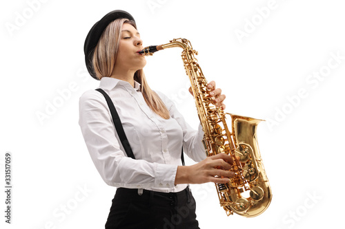 Cuadro en lienzo Young female musician playing a saxophone