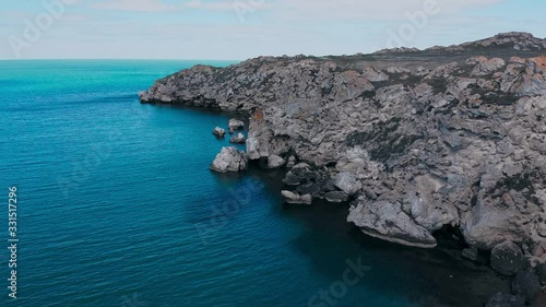 Flight near the rocks in the Crimea near the sea photo