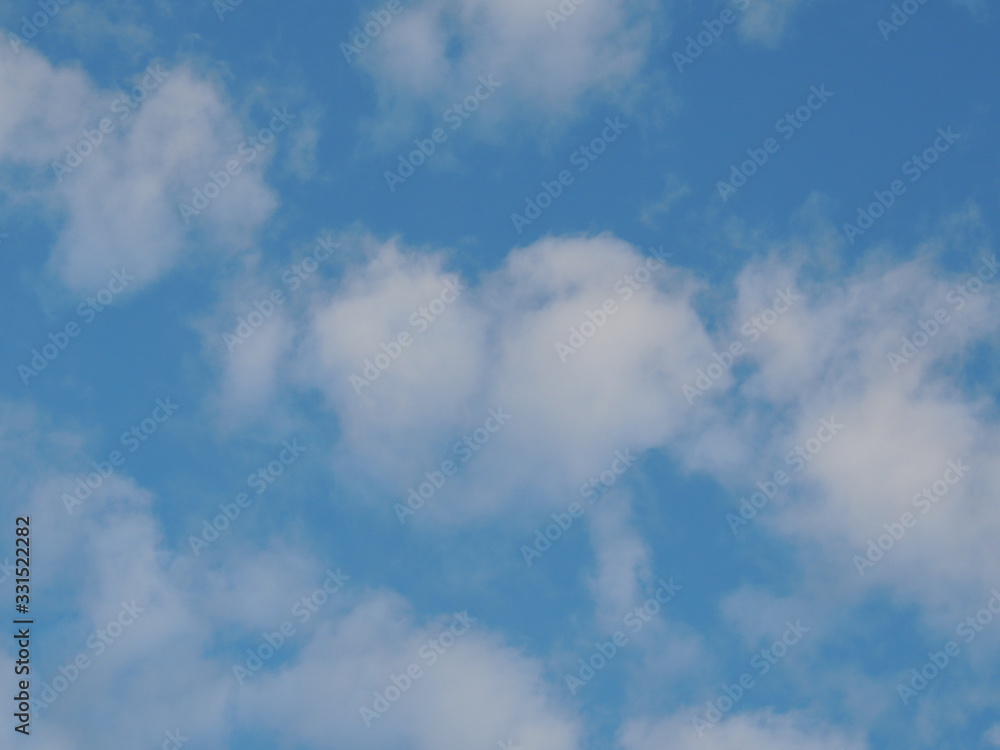 Blue sky and puffy clouds Blue sky and puffy clouds