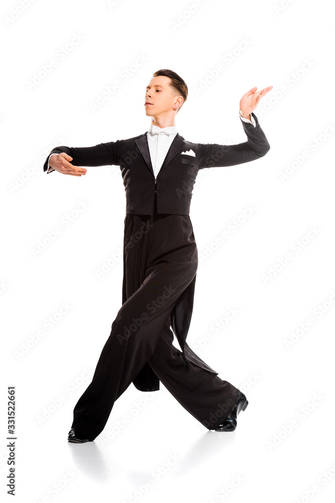 elegant young ballroom dancer dancing isolated on white