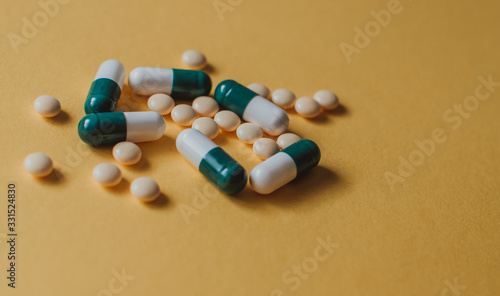 Medicine pills or capsules. Pharmaceutical medicament. Antibiotic, painkiller closeup. Medical flat lay.