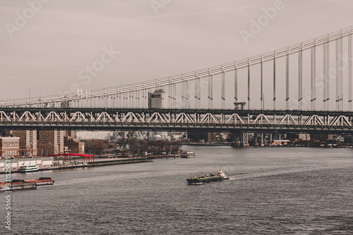 New York City streets of Manhattan. Big city life in New York State. Manhattan streets full of people and yellow taxi. Busy district streets. Skyscrapper buildings. Historical buildings. photo