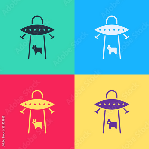 Pop art UFO abducts cow icon isolated on color background. Flying saucer. Alien space ship. Futuristic unknown flying object. Vector Illustration