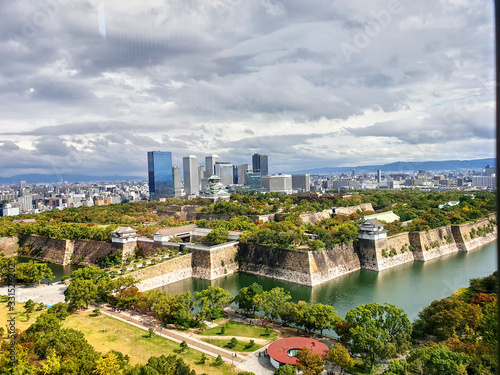 View of the city with Osaka castle park and canals around it