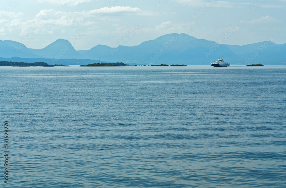 Norwegian fjords sea mountain view with sailing ferry boat, Norway Norwegian fjords sea mountain view with sailing ferry boat, Norway