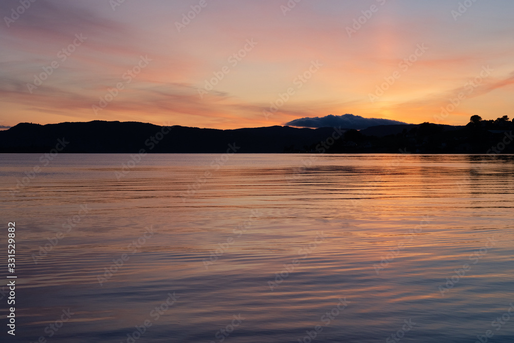 Fjords sunset mountain landscape, Rosendal, Norway