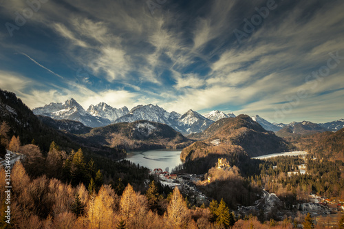 Alps mountains in germany near the Hohenschwangau lake, castle and town. View from Neuschwanstein castle balcony.