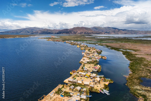 Tableau sur toile Aerial view of Uros Floating Islands on Titicaca Lake, the highest navigable lake in the world, near Puno, Peru, South America