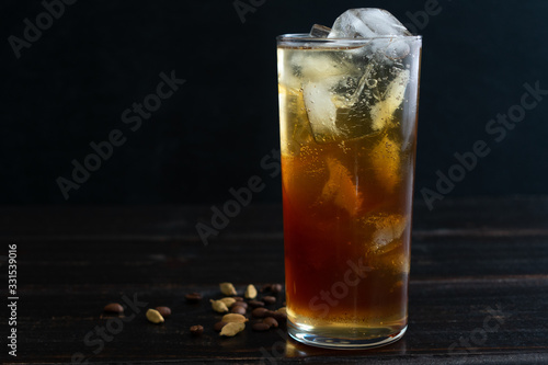 Citrus Cardamom Coffee Spritzer: A mocktail made with coffee, lemon, and cardamom