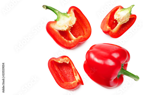 red sweet bell pepper with slices isolated on white background. top view