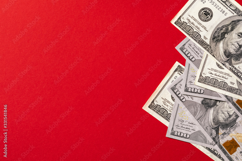 money isolated on red background money isolated on red background
