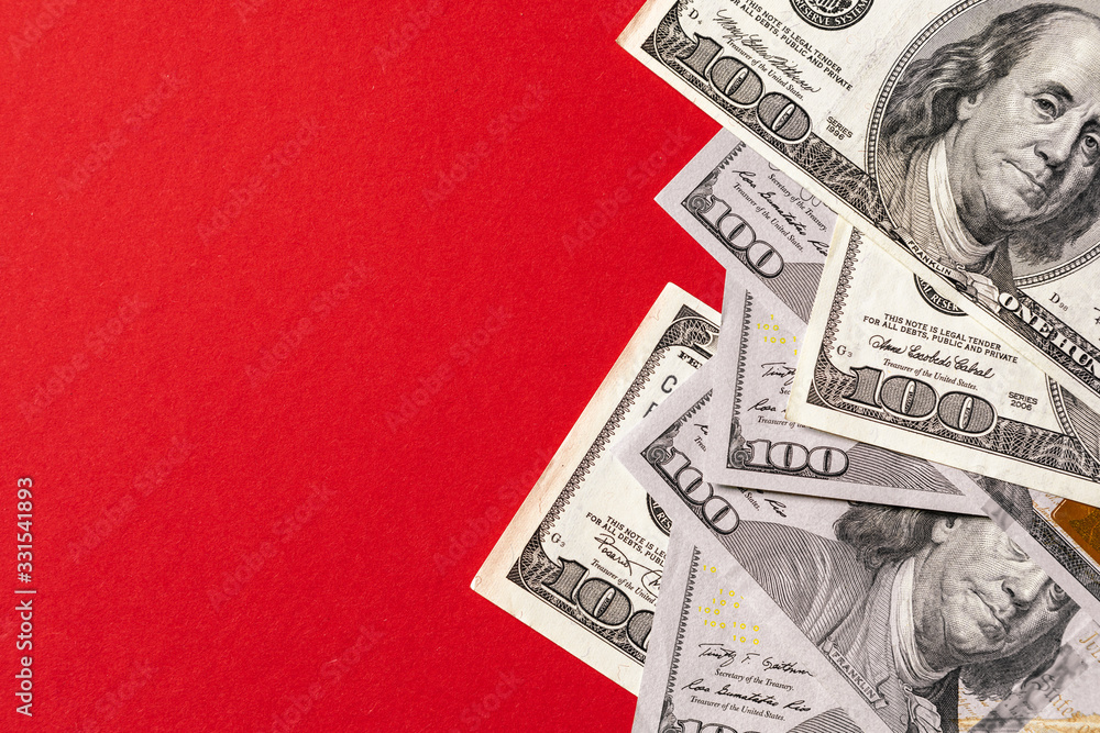 money isolated on red background money isolated on red background