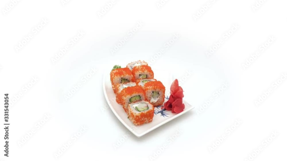 Sushi rolls rotating over isolated on white background Sushi rolls rotating over isolated on white background