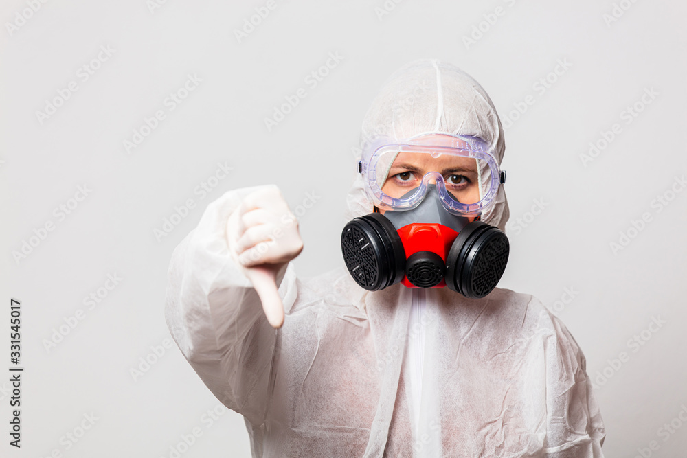 female doctor in protection suit and glasses with mask female doctor in protection suit and glasses with mask