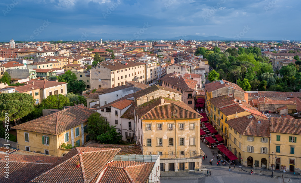 Obraz premium Red roofs of Pisa old town. Pisa tower viewpoint. Toscana province, Italy.
