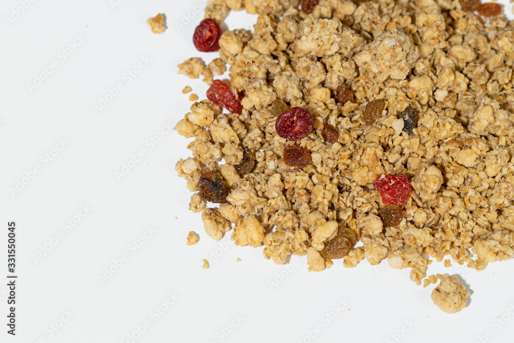Muesli on a white background close-up Muesli on a white background close-up