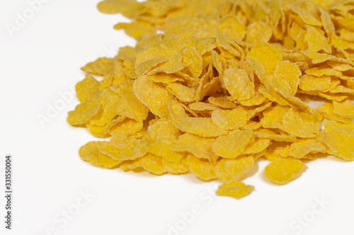 Corn flakes on a white background close-up