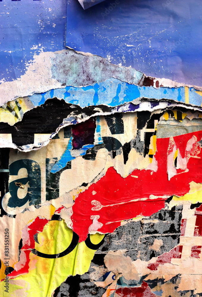Fototapeta premium Old ripped torn posters grunge texture background creased crumpled paper backdrop placard surface / Urban street posters 