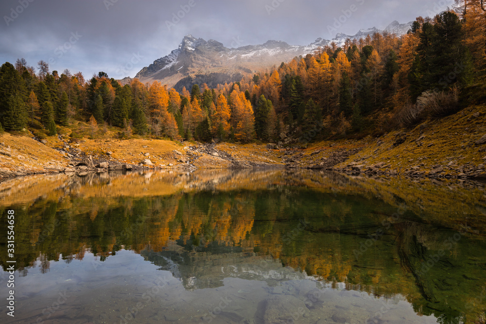 Lake Scispadus during autumn season, Val di Campo, Graubunden, Switzerland