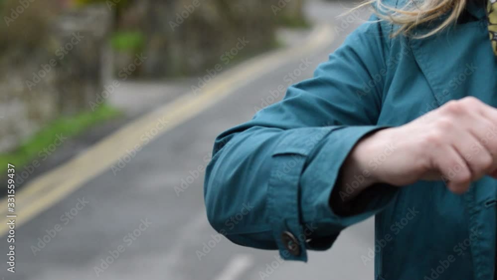 Elbow bump greeting to avoid the spread of coronavirus. Two friends meet, instead of greeting with a hug or handshake, they stay apart and tap elbows together. Elbow bump greeting to avoid the spread of coronavirus. Two friends meet, instead of greeting with a hug or handshake, they stay apart and tap elbows together.