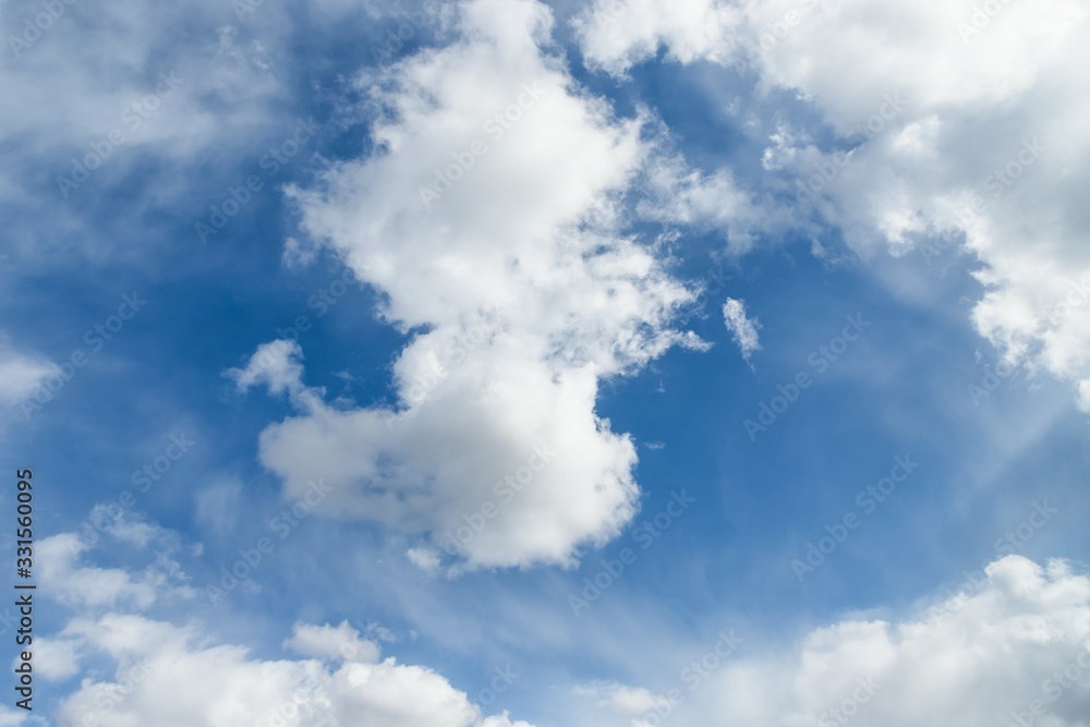 Naklejka premium Incredible blue sky with beautiful white clouds. Clouds floating on blue sky