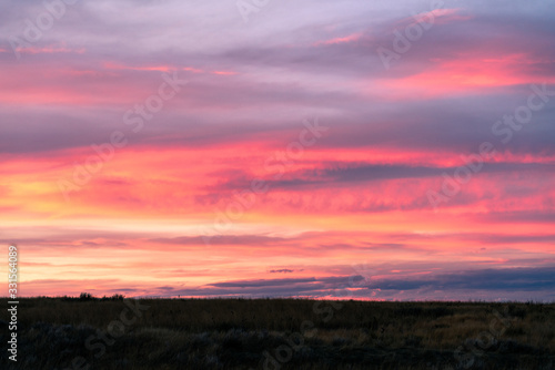 Beautiful sunset sky with green glass