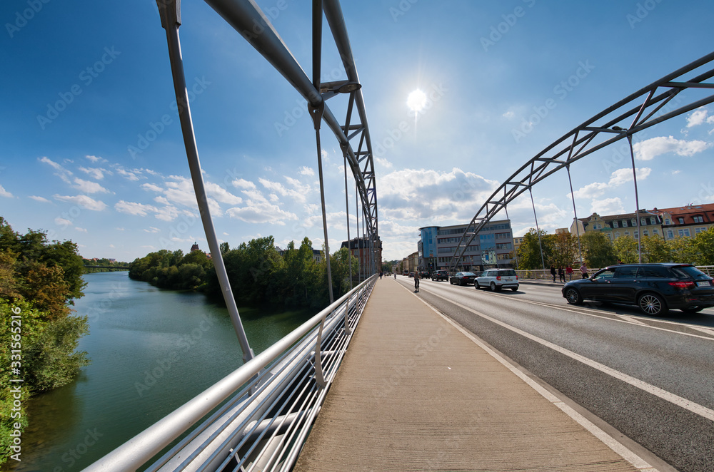 Fototapeta premium BAMBERG, GERMANY - SEP 11, 2019: Modern bridge of Bamberg, Germany