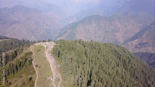 Aerial zoom in shot of siri paya top pakistan mountains in naran valley near shogran photo