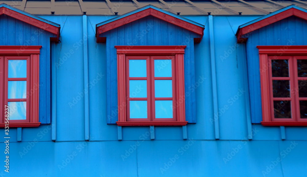 blue house facade skylight windows traditional architecture