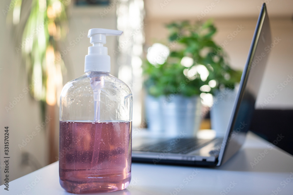 hand sanitizer in home office - coronavirus hand sanitizer in home office - coronavirus