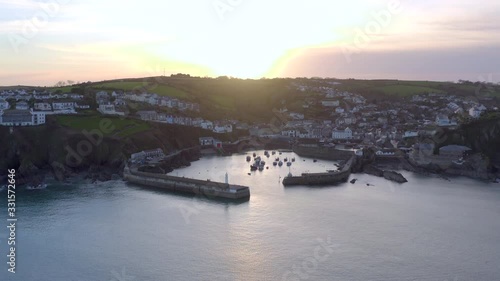 Mevagissey Harbour at Sunset in Cornwall UK photo