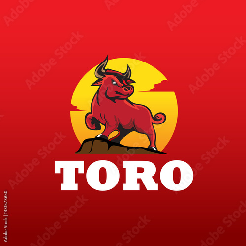 Powerful red bull toro mascot logo standing on a hill against a yellow sunset sun for sports teams fitness branding or energy drink marketing