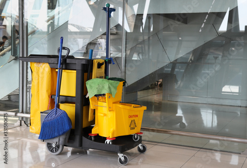 Closeup of janitorial, cleaning equipment and tools for floor cleaning. photo
