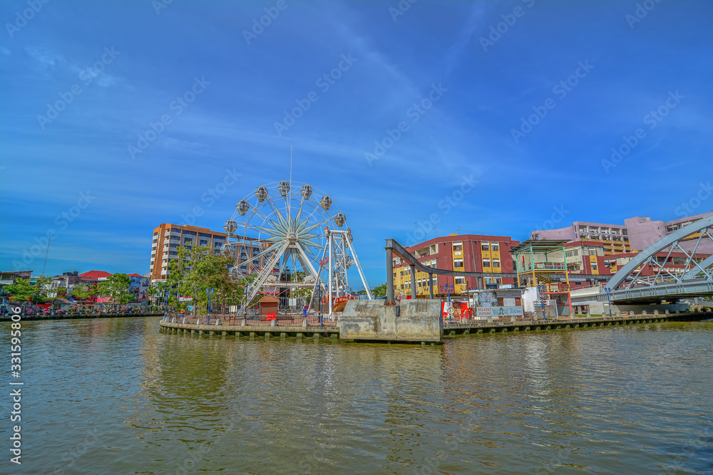 MALACCA, MALAYSIA - JAN 31: Malacca eye on the banks of Melaka river on JAN 31, 2016 in Malacca, Malaysia. Malacca has been listed as a UNESCO World Heritage Site since 7 July 2008.
