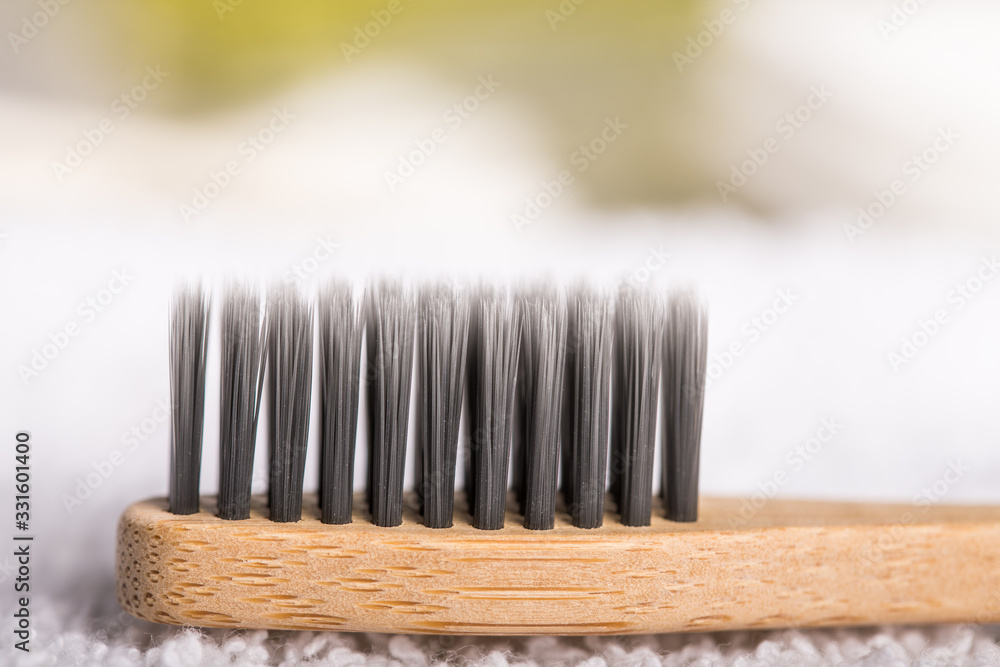 Natural bamboo toothbrush. Organic wooden brush. Go green. Save the world. Copy space. Natural bamboo toothbrush. Organic wooden brush. Go green. Save the world. Copy space.