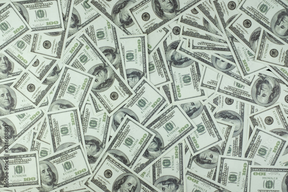 Group of money stack of 100 US dollars banknotes a lot of the background texture top view Group of money stack of 100 US dollars banknotes a lot of the background texture top view