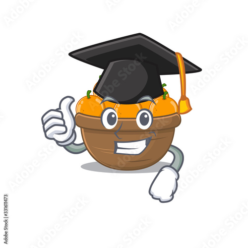 A picture of orange fruit basket with black hat for graduation ceremony