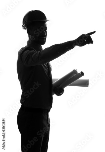 Silhouette of male engineer with drawings showing something on white background
