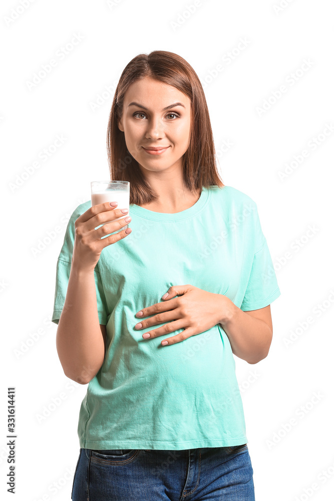 Beautiful pregnant woman with glass of milk on white background Beautiful pregnant woman with glass of milk on white background