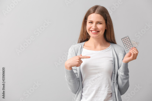 Young woman with birth cont...