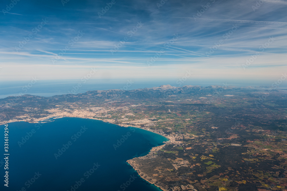 Palma de Mallorca and Bay of Palma with the tramuntana mountains in the background  - aerial view 