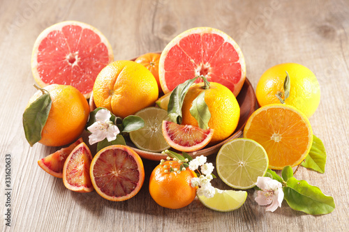 citrus fruit assortment  grapefruit  orange  lemon and leaf