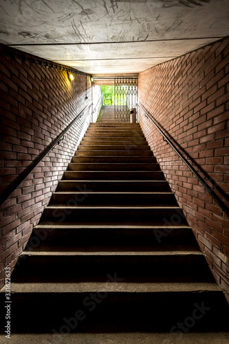 Stairway with a railing that rises from the depths