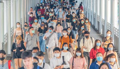 Photography Bangkok City, Thailand : 03/12/2020 : Unidentified people, Crowd of Thai wearing face mask for health due to Coronavirus Disease or covid-19 and  air pollution in mass transit in public